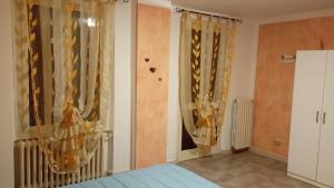 Postel nebo postele na pokoji v ubytování Casa Alice