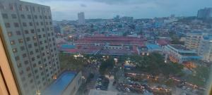 a view of a city at night from a building at BCC Prime Location Vintage APT at Penuin Batam Island by MESA in Nagoya