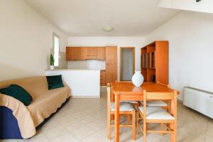 Kuchyň nebo kuchyňský kout v ubytování Oasi Kite - Stagnone Apartments