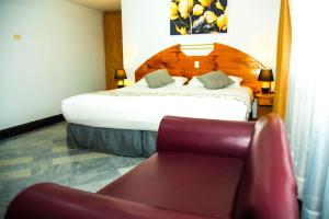Postel nebo postele na pokoji v ubytování Hotel la Giralda