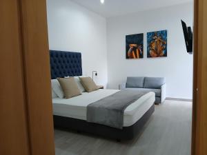 Letto o letti in una camera di Charming House Tarrafal
