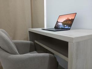 TV o dispositivi per l'intrattenimento presso Charming House Tarrafal