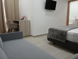 TV o dispositivi per l'intrattenimento presso Charming House Tarrafal