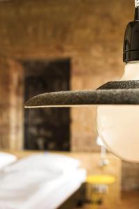 a close up of a light with a hat on it at Komfort-Apartment 1903 in Walsheim