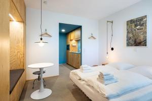 Katil atau katil-katil dalam bilik di Standard-Apartment 1899