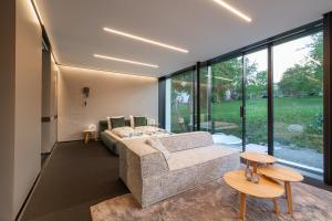 Ένα ή περισσότερα κρεβάτια σε δωμάτιο στο Kloster Suite, Aussensauna, Hottube - ÜhlingenBirkendorf
