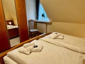 Postel nebo postele na pokoji v ubytování Hansen Grevelingstieg 16