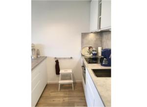 Kuchyň nebo kuchyňský kout v ubytování Strandnahe Ferienwohnung mit Terrasse