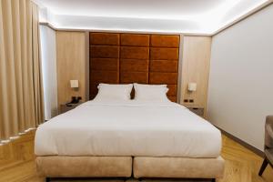 Rúm í herbergi á Hotel Fieri