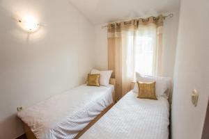 Posteľ alebo postele v izbe v ubytovaní House Suzi1