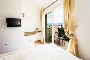 Postel nebo postele na pokoji v ubytování House Suzi1