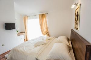 Postel nebo postele na pokoji v ubytování House Suzi1