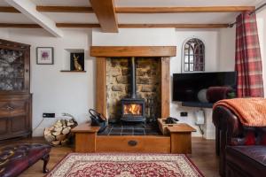 Et tv og/eller underholdning på Burn Cottage - with Hot Tub