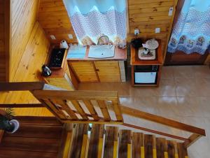 an overhead view of a kitchen with a sink at Cabanas Pôr do Sol - São Chico in São Francisco de Paula