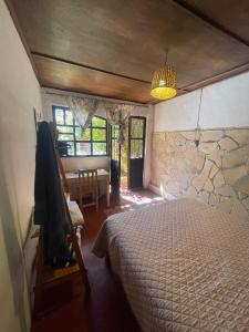 Un pat sau paturi într-o cameră la Casa Jasmine +2 fotografii