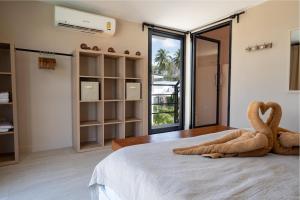 Ένα ή περισσότερα κρεβάτια σε δωμάτιο στο Manao Seaview Pool Villa 34 - 5 Mins Walk To The Beach +32 φωτογραφίες