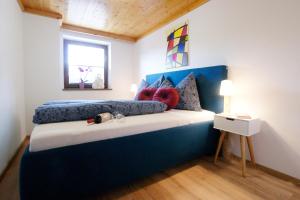 Postel nebo postele na pokoji v ubytování HauserA Appartement