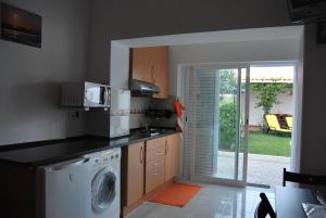 Η κουζίνα ή μικρή κουζίνα στο Apartamentos Costa +21 φωτογραφίες