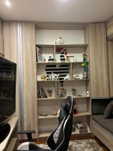 TV a/nebo společenská místnost v ubytování Casa 74 Diamantina MG