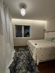 Postel nebo postele na pokoji v ubytování Casa 74 Diamantina MG + 7 fotografií