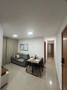 Posezení v ubytování Apartamento Espaço Aruba + 24 fotografií