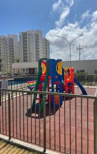 a playground in a city with at Espaço Aruba l Apê confortável perto da Praia in São Luís