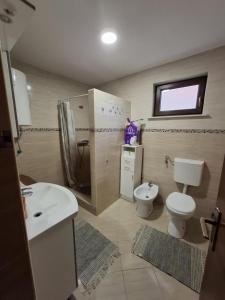 Koupelna v ubytování Apartman Konjević + 10 fotografií
