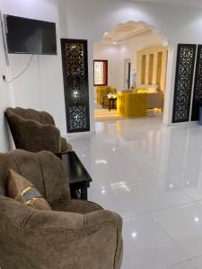 Posezení v ubytování ANTIKA HOTEL / انتيكا للشقق الفندقيه + 29 fotografií