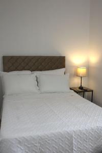 En eller flere senge i et værelse på Eco Villa, El Sunzal ISA Surfing