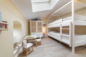 Ένα ή περισσότερα κρεβάτια σε δωμάτιο στο Casa Mare +10 φωτογραφίες