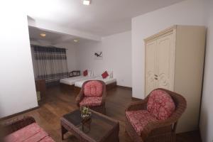Posezení v ubytování Chaminrich villa