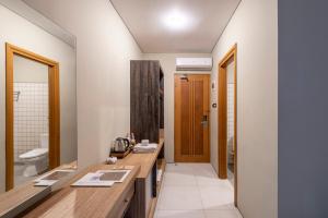 Koupelna v ubytování Mogens Guesthouse + 14 fotografií