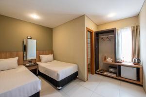 Postel nebo postele na pokoji v ubytování Mogens Guesthouse