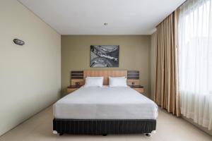 Postel nebo postele na pokoji v ubytování Mogens Guesthouse