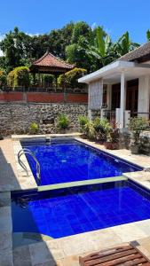 Bazén v ubytování Kaia Lovina Guest House nebo v jeho okolí