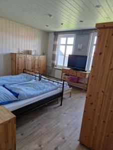 Postel nebo postele na pokoji v ubytování Großes Ferienhaus Nordhastedt 2- 6 Personen 16 km zur Nordsee 24 km Büsum 45km St Peter Ording