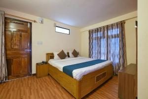 NAiNi VIEW RESORT客房内的一张或多张床位
