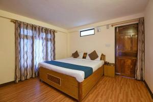 NAiNi VIEW RESORT客房内的一张或多张床位