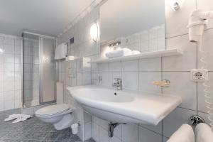 Kúpeľňa v ubytovaní SCHMID Rooms & Apartments + 37 fotografií