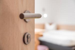 Postel nebo postele na pokoji v ubytování SCHMID Rooms & Apartments