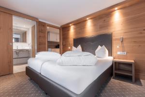 Postel nebo postele na pokoji v ubytování SCHMID Rooms & Apartments