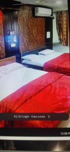 Krevet ili kreveti u jedinici u okviru objekta Khan Resort Matheran