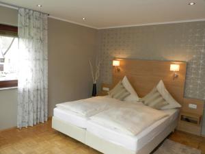 Ένα ή περισσότερα κρεβάτια σε δωμάτιο στο Weingut Stassen +22 φωτογραφίες