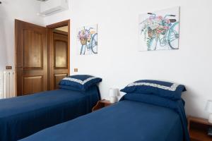 Postel nebo postele na pokoji v ubytování B&B Villa Dei Desideri