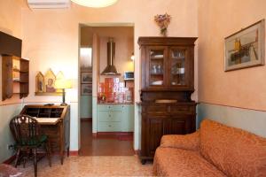 A kitchen or kitchenette at Poggio Imperiale Apartments