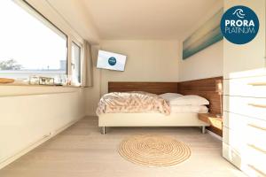 Postel nebo postele na pokoji v ubytování Prora Platinum Penthouse Diamant