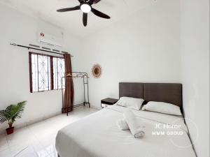 Photo de la galerie de l'établissement Kempas Kampung style 12pax Family Suites, à Johor Bahru