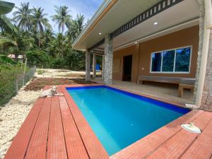 Bazén v ubytování EcoSiquijor Haven nebo v jeho okolí