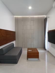 TV a/nebo společenská místnost v ubytování Rauda Living Space Syariah