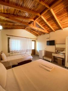 Cama ou camas em um quarto em Likya Adrasan